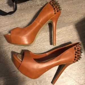 Spiked and crystal four-inch heels